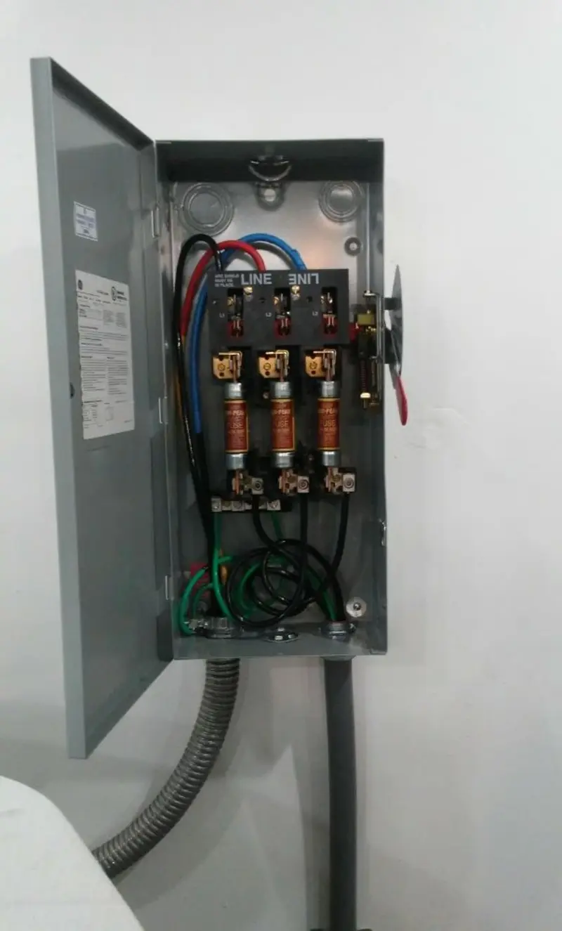 Three-phase disconnect switch installed for Smoke Detector Installation in Walker